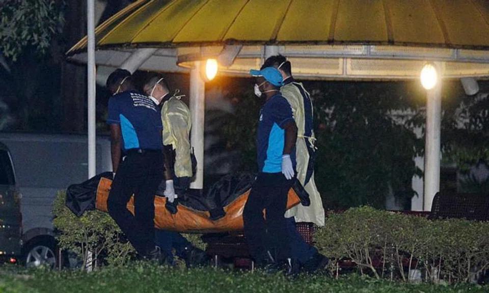 The woman was found lying face down and one of her cats was lying near her body. PHOTO: SHIN MIN DAILY NEWS