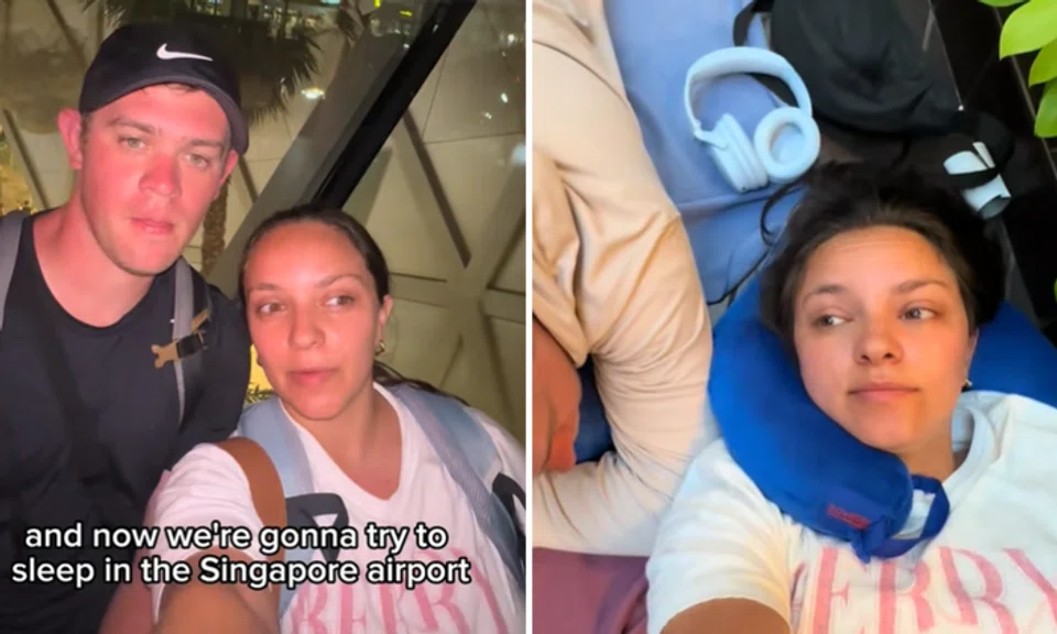 The couple found a spot at a "sleeping village" at what appears to be Terminal 1.