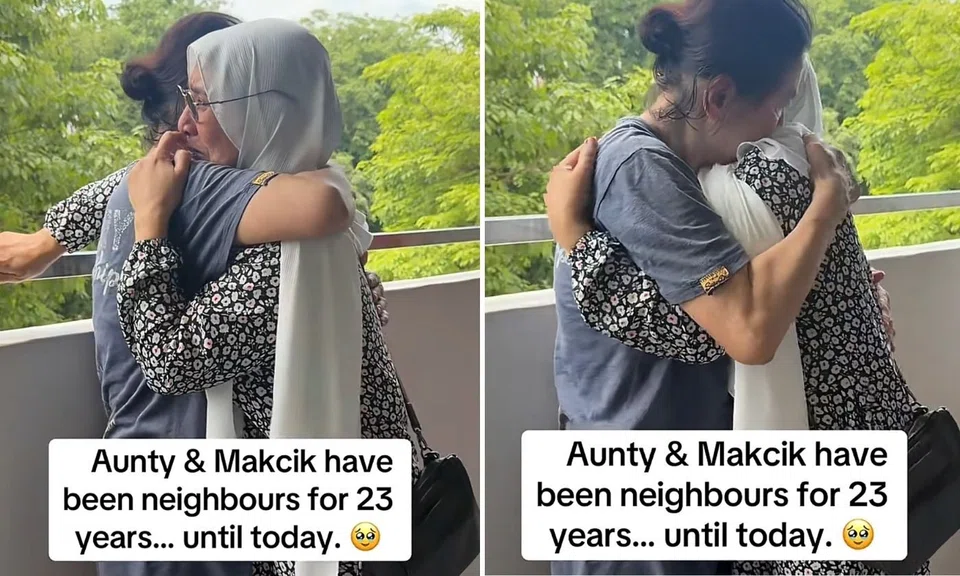 Chinese and Malay auntie locked in tearful embrace