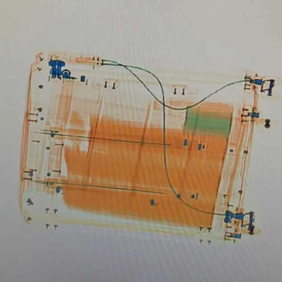Immigration and Checkpoints Authority officers conduct selective searches at the checkpoints. PHOTO: IMMIGRATIONS AND CHECKPOINTS AUTHORITY/FACEBOOK