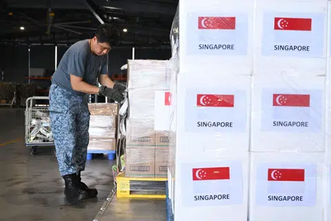 An RSAF serviceman preparing the relief supplies for the second tranche of Singapore’s humanitarian assistance to Myanmar.