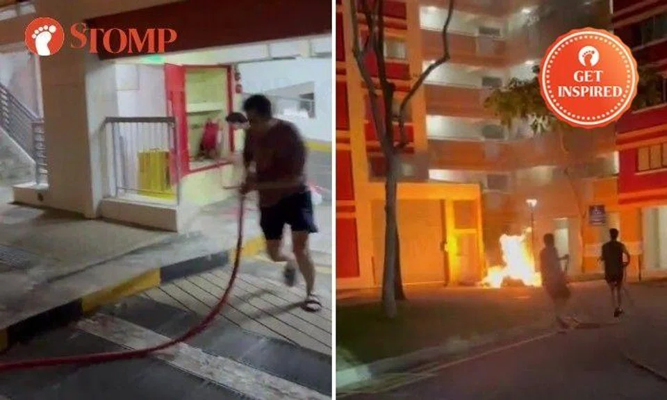 Stomper HZ shared a video of several men rushing to pull a hosereel from a nearby multi-storey carpark to fight the fire.