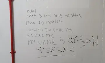 Police find graffiti that left name behind in Sembawang, 2 men arrested for loanshark harassment