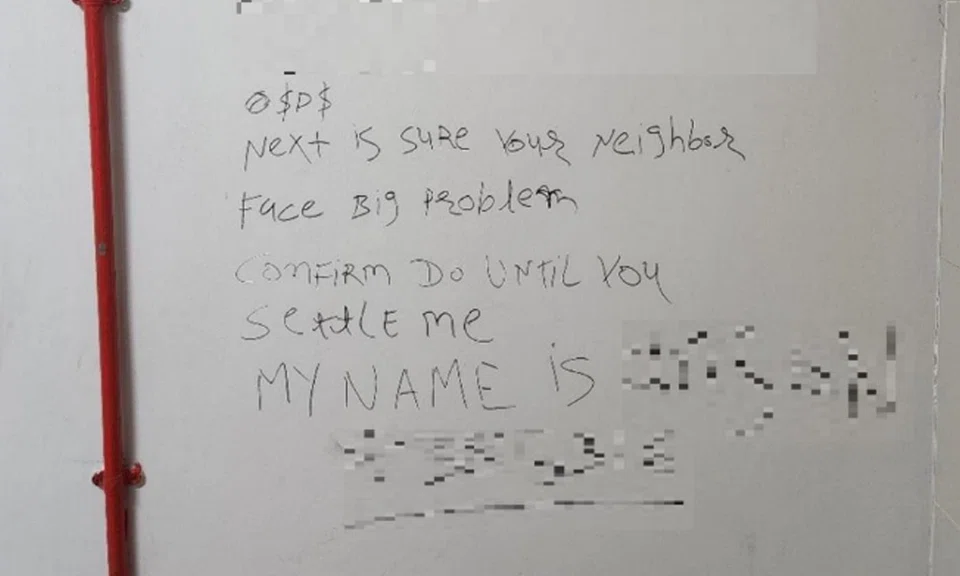 Police find graffiti that left name behind in Sembawang, 2 men arrested for loanshark harassment