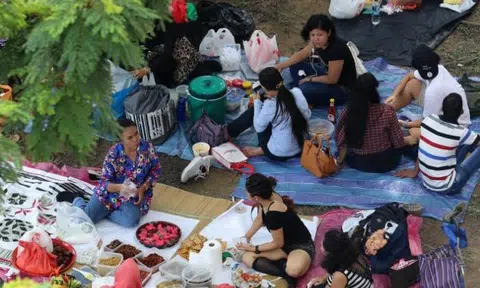 Maids outside City Plaza