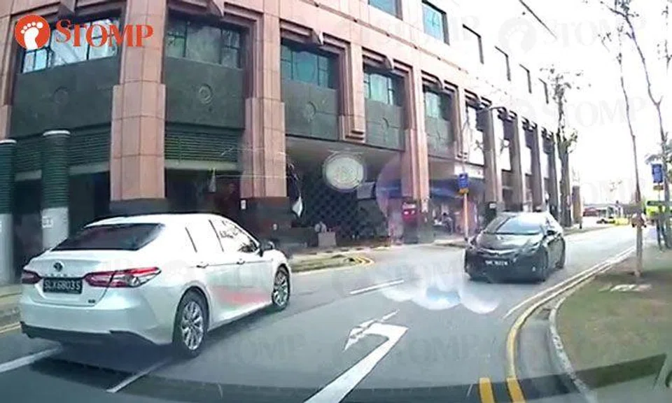 Woman drives against traffic in Tampines -- then waves at motorist and asks him to move aside