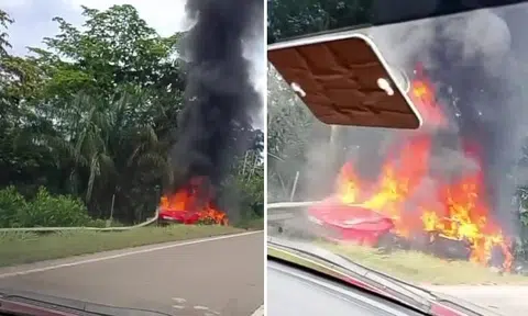 A Singapore-registered Ferrari crashed into a guard rail and caught fire on a highway in Pahang.