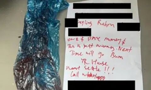 Debtor's note and plastic bag with red paint left at Geylang Bahru unit, woman arrested
