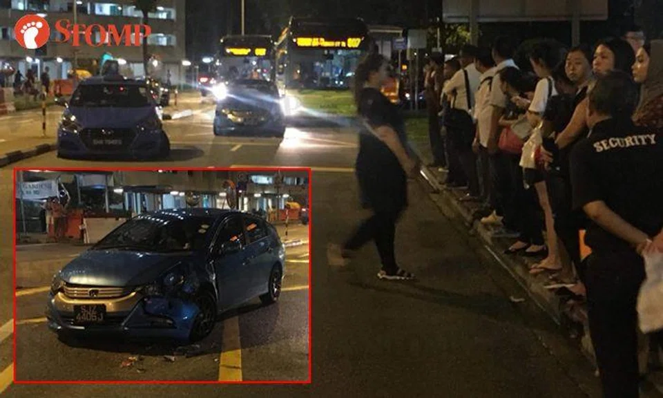 Stomper steps up to help after accident involving car, taxi and bus in Yishun