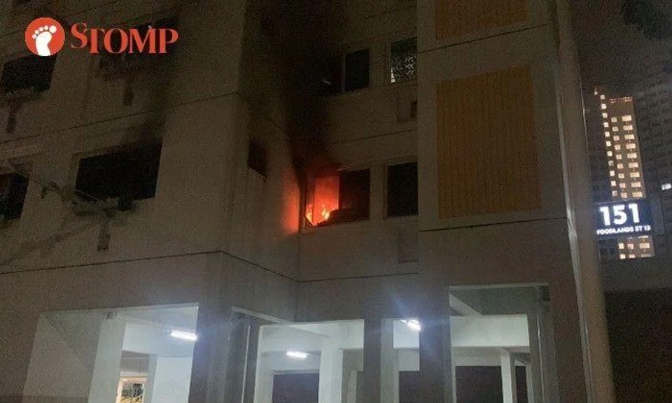 Photos shared by a Stomper show flames in a second-storey flat of the block and at least two fire engines at the scene.