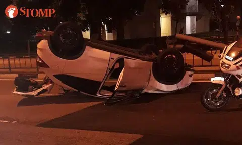 Driver, 50, arrested for drink-driving after car turns turtle at Pioneer Road junction