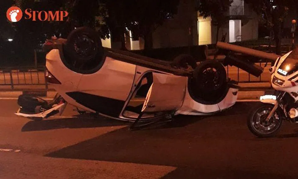 Driver, 50, arrested for drink-driving after car turns turtle at Pioneer Road junction
