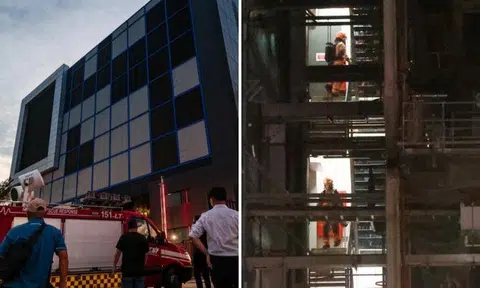 Firefighters were still involved in damping-down operations at a data centre in Loyang on Sept 11. Photos: Shin Min Daily News