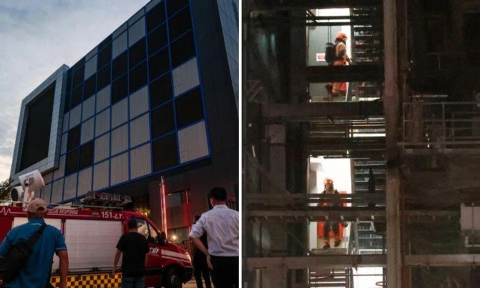 Firefighters were still involved in damping-down operations at a data centre in Loyang on Sept 11. Photos: Shin Min Daily News
