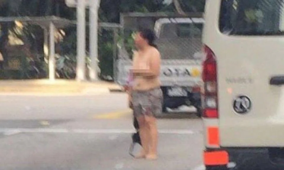 38-year-old topless woman causes traffic jam on Nicoll Highway: She 'was carrying her bra in her right hand'