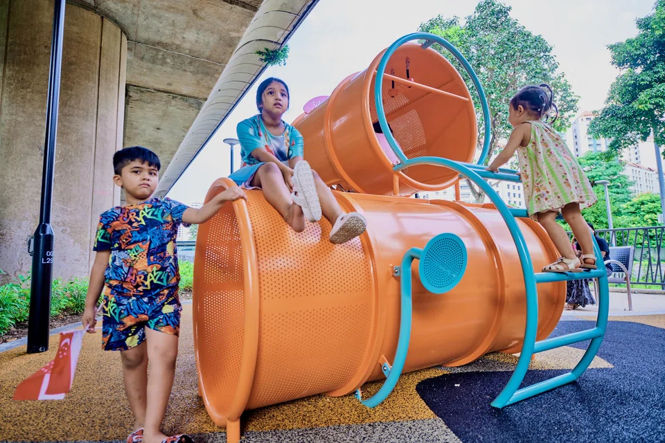The Oil Drum Playground is a short walk from Yew Tee MRT station and sheltered by the MRT tracks.