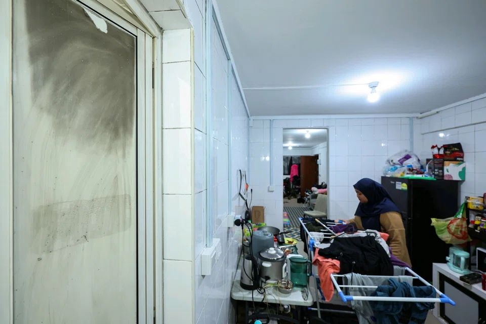 The fire left its traces on the flat and on Ms Norhayani's family.