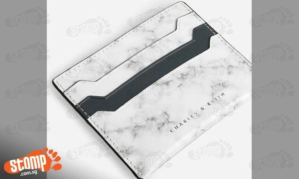 I lost my card holder in a taxi: You can keep the $50, just return me my IC