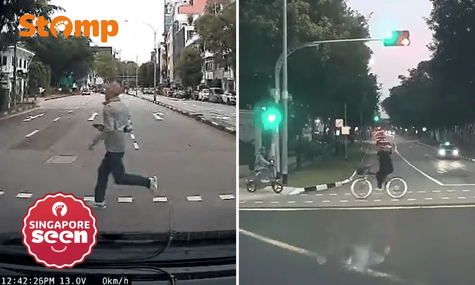 Pedestrian sprints across red light, cyclist follows suit in close calls caught on dashcam
