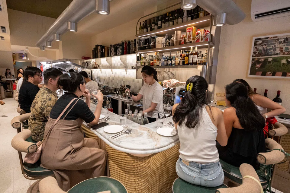 The first 28 guests are seated when doors open and everyone else is given a time to return, their names scribbled down on a tiny blackboard.