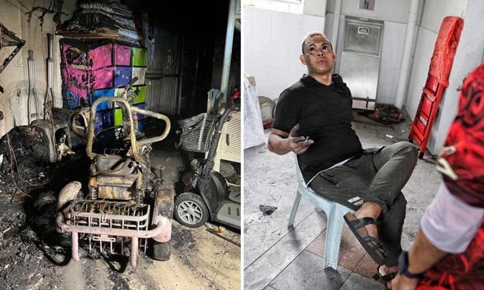 Mr Eber (right), the tenant of the burnt flat, said he had just purchased the PMA a week ago. 