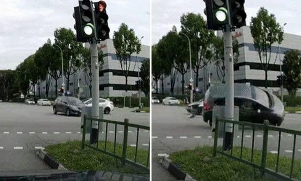 A video of the accident posted on Facebook shows a black car travelling straight through a traffic junction, when a light-coloured car collides with it. PHOTOS: SCREENGRAB FROM RAVEN QIU/FACEBOOK