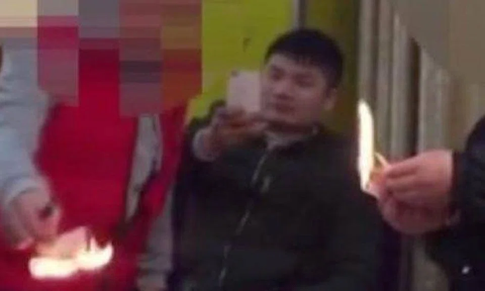 Friends in China come up with 'cash burning' game to see who's richer, get fined