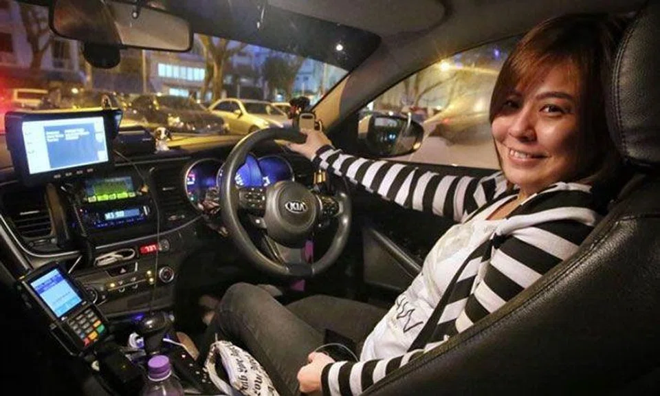 Ms Liu Anhui, 33, is a single mother and has worked as a taxi driver for half a year. PHOTO: SHIN MIN DAILY NEWS