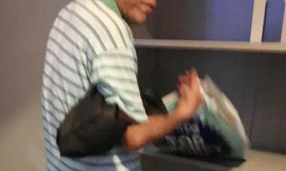 Uncles allegedly take donated books at Marine Parade library, then sell them off