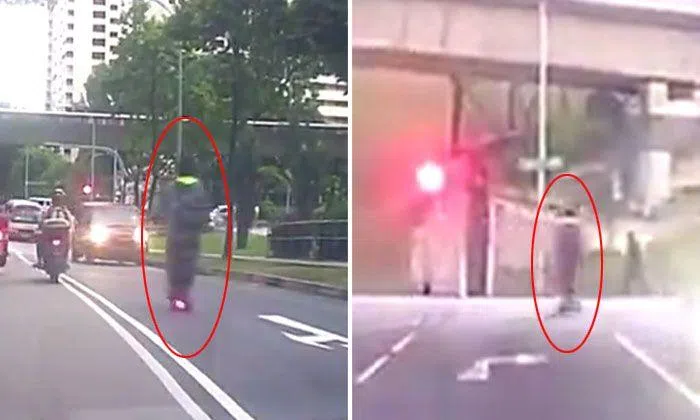 E-scooter rider with a death wish beats two red lights and goes against ...