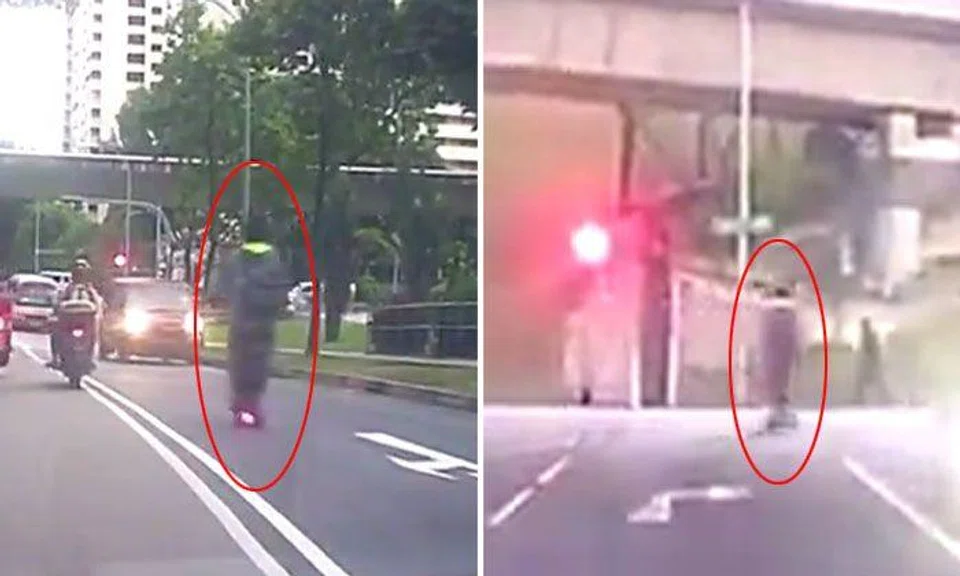 E-scooter rider with a death wish beats two red lights and goes against ...
