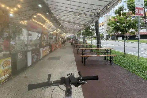 Pasar malam stalls block cycling path, sparks online debate