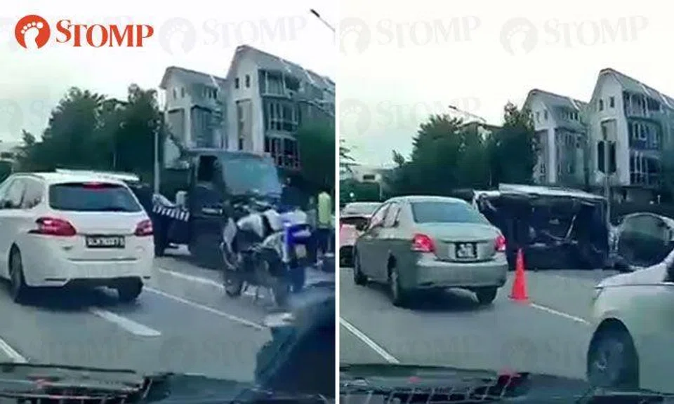 Lorry skids and overturns along Upper Serangoon Road, driver assisting with investigations
