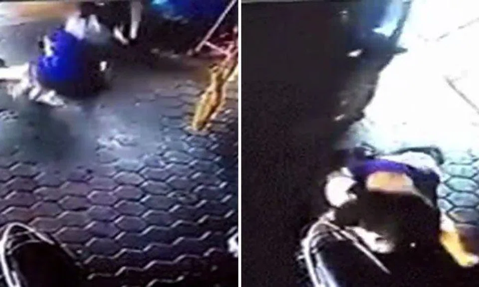 Real-life spiderman: Dad uses lightning quick reflexes to save his children from speeding car in Indonesia