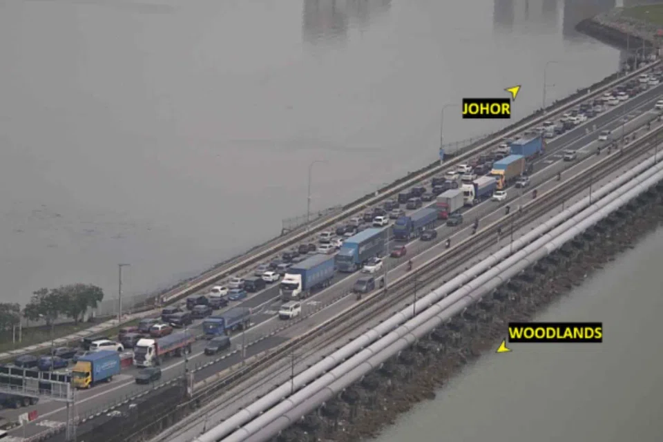A view of the traffic at the Woodlands checkpoint on March 21 at 9.40am.