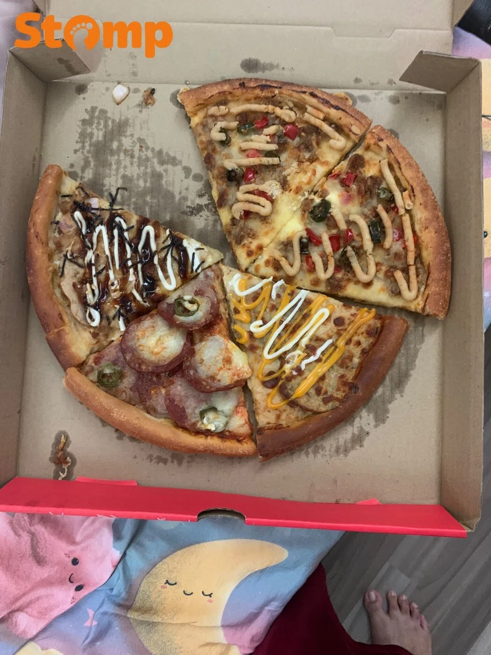 GrabFood user allegedly gets pizza with one slice missing, says $0.50 refund made her feel like ‘beggar’