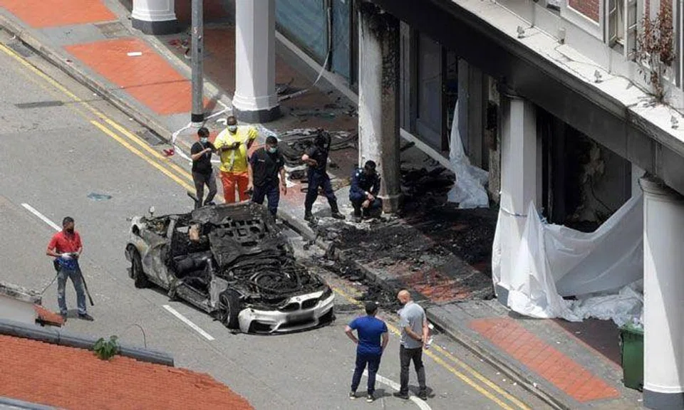 The car was believed to have sped along Tanjong Pagar Road before colliding into a shophouse and catching fire. ST PHOTO: ALPHONSUS CHERN
