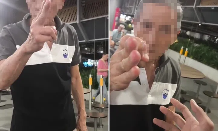 elderly man shoves tray, throws food at sengkang hawker centre