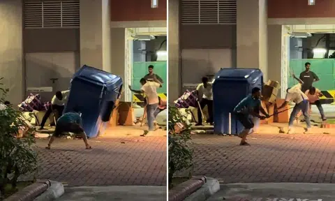 men attempt to kill rats under recycling bin at tampines hdb block