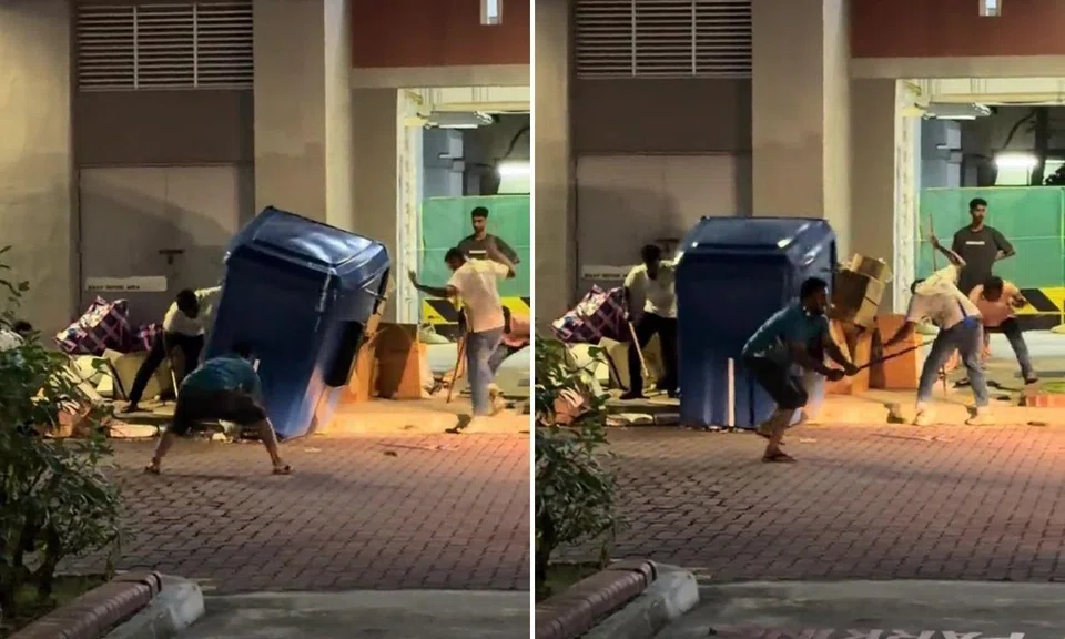 men attempt to kill rats under recycling bin at tampines hdb block