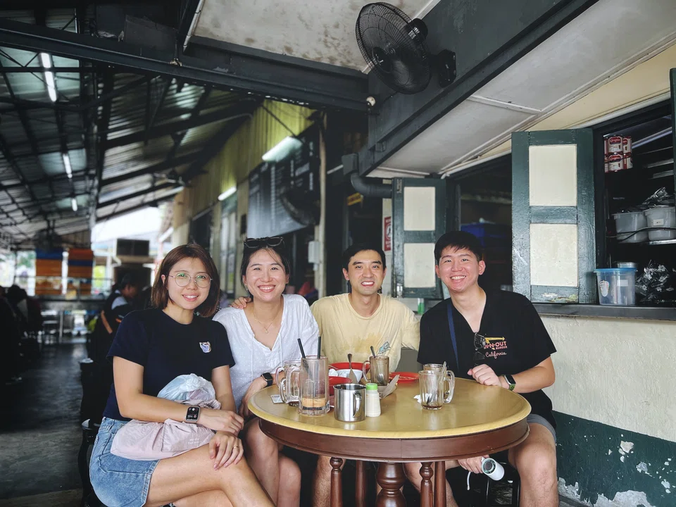For customers (from far left) Samantha Ang, Felicia To, Harris Sim, and Jonathan To, Kluang Rail Coffee was both a practical pit stop that satisfied their hunger and a sweet walk down memory lane.