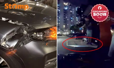 Car drives into open tailgate of lorry 'perfectly concealed' in HDB carpark at night, police investigating