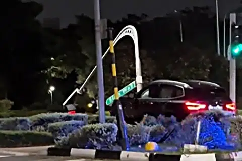 BMW driver who crashed into traffic light arrested for drink driving