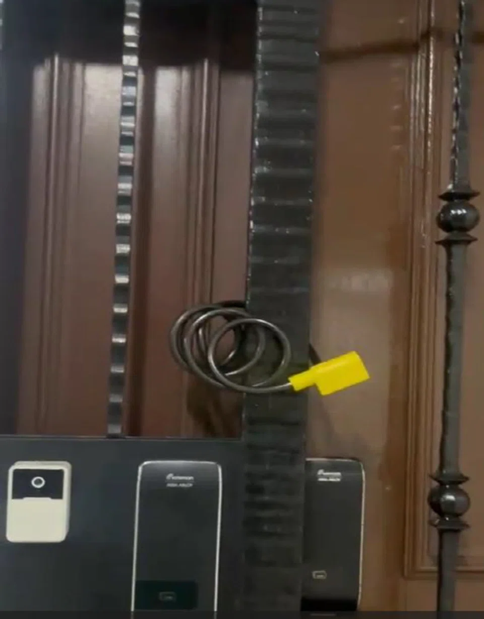 Man, 26, arrested for loan shark harassment after bicycle lock found fastened around Sembawang unit gate