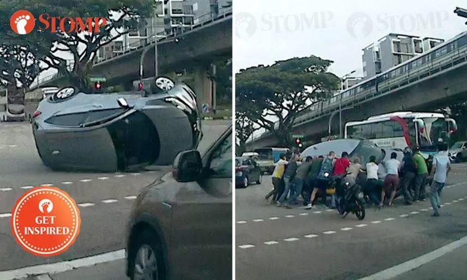 Strength in unity: Good Samaritans help to right overturned car after Sembawang crash