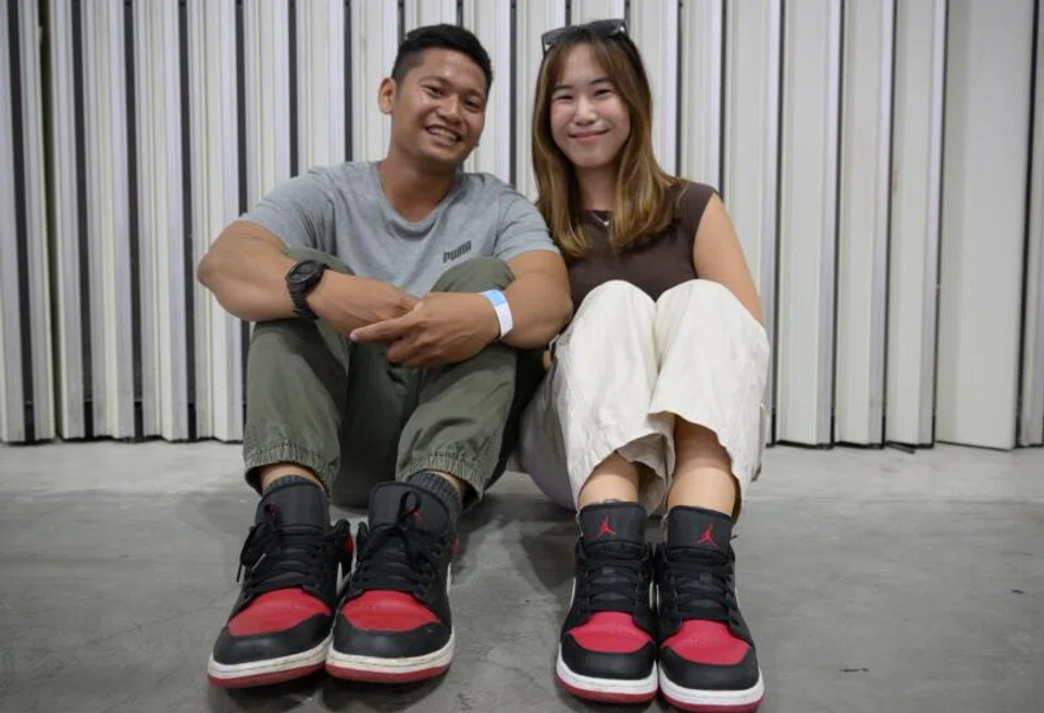 Mr Carl Iyog and Ms Sher Low with their matching Air Jordans.