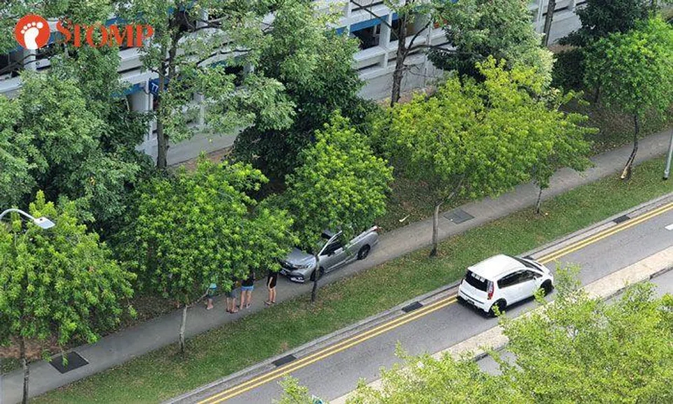 Car ends up on pavement in accident at Woodlands Crescent