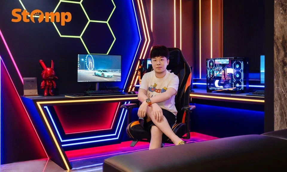 man sitting in gaming room of newly renovated home