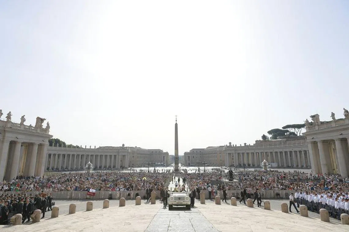 FILE PHOTO: Pope Francis arrives for the weekly general audience at the Vatican June 22, 2022. Vatican Media/­Handout via REUTERS/File Photo