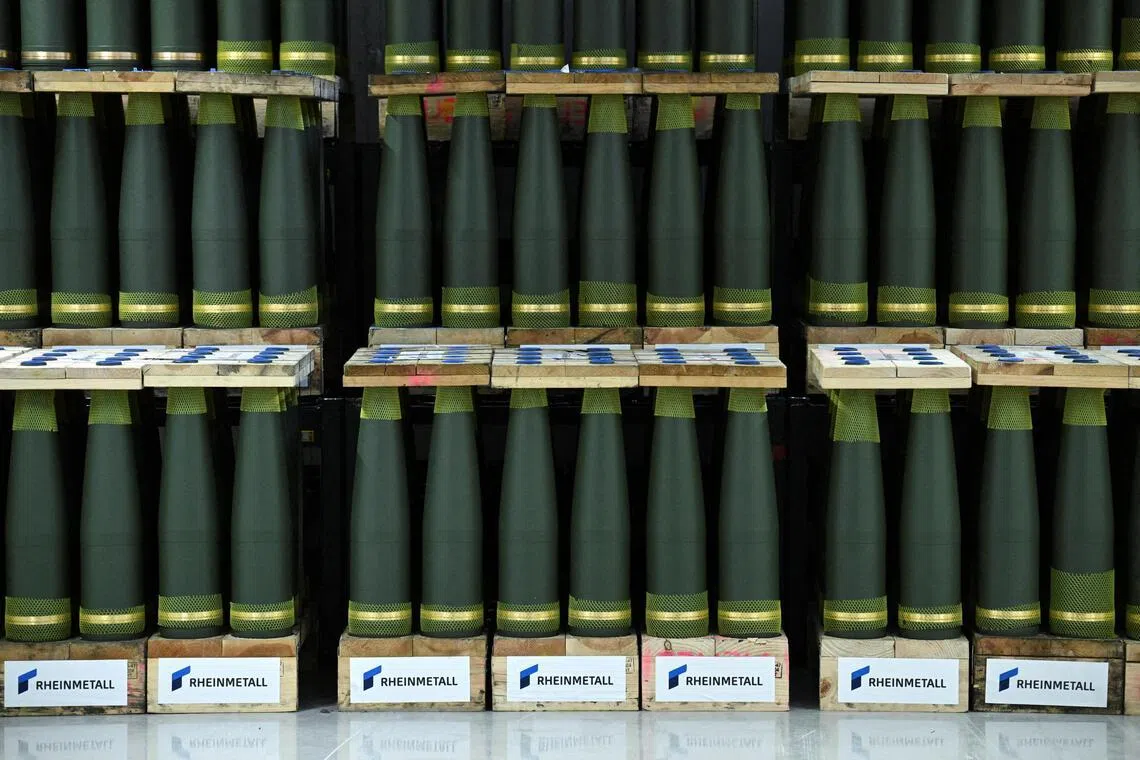 Artillery shells lined up in an storage room at a Rheinmetall plant in Unterluess, Germany.